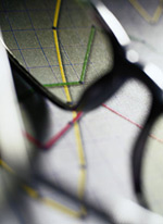 A view through eyeglasses over a sales map